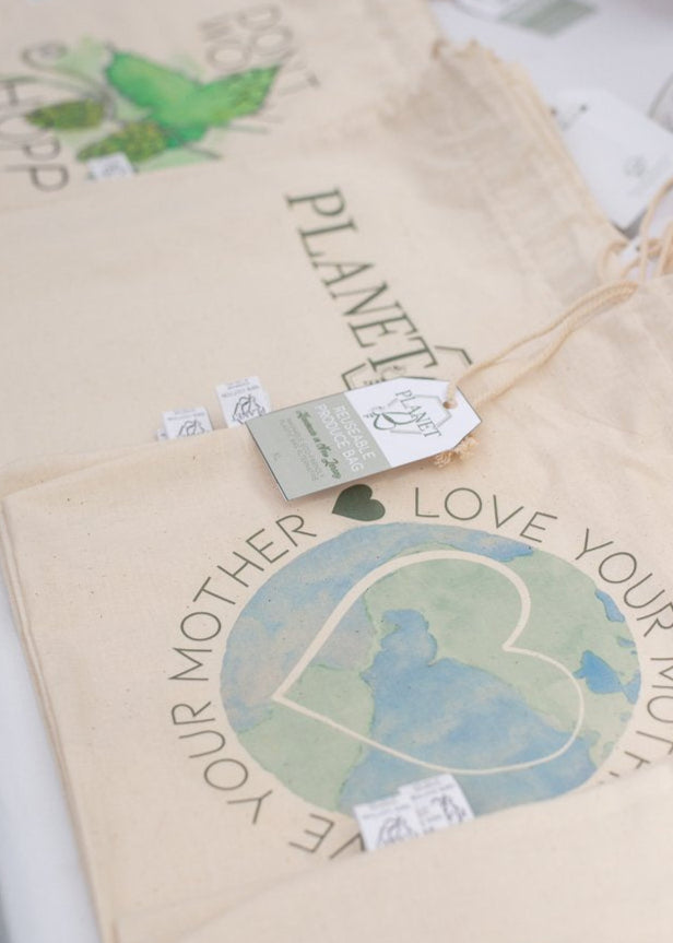 Planet B produce bags with watercolor artwork of Planet Earth that says "Love Your Mother"